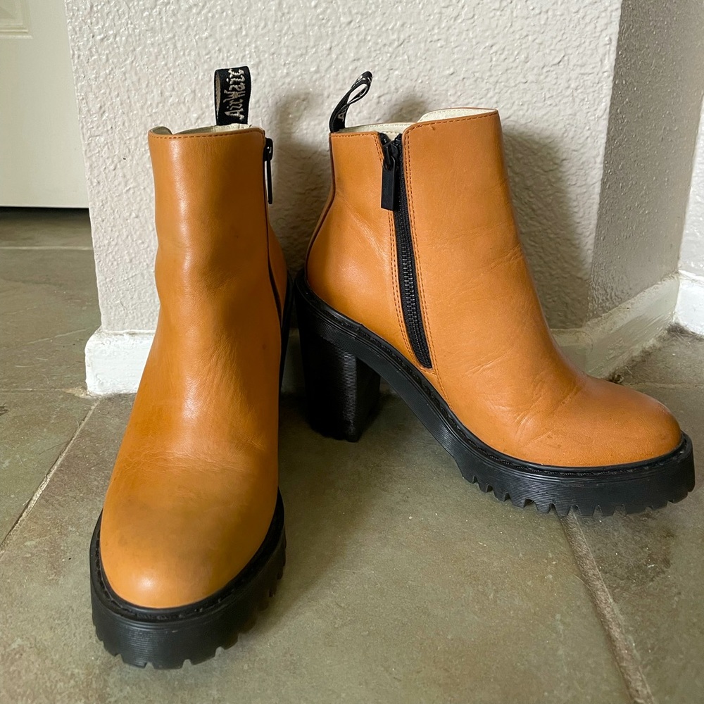 Dr. Martens heeled ankle boots.